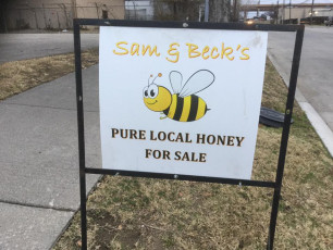 Sam sells honey on site.